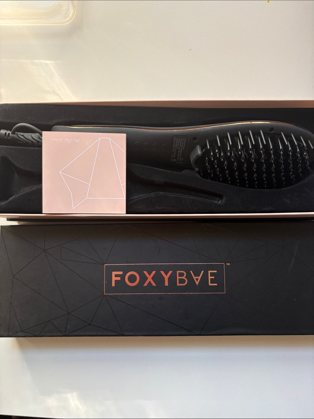 FOXYBAE Heated Straightening Brush in Black with Rose Gold Logo
